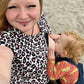 mum breastfeeding in her stylish mum breastfeeding dress uk by stylish mum breastfeeding dress brand 